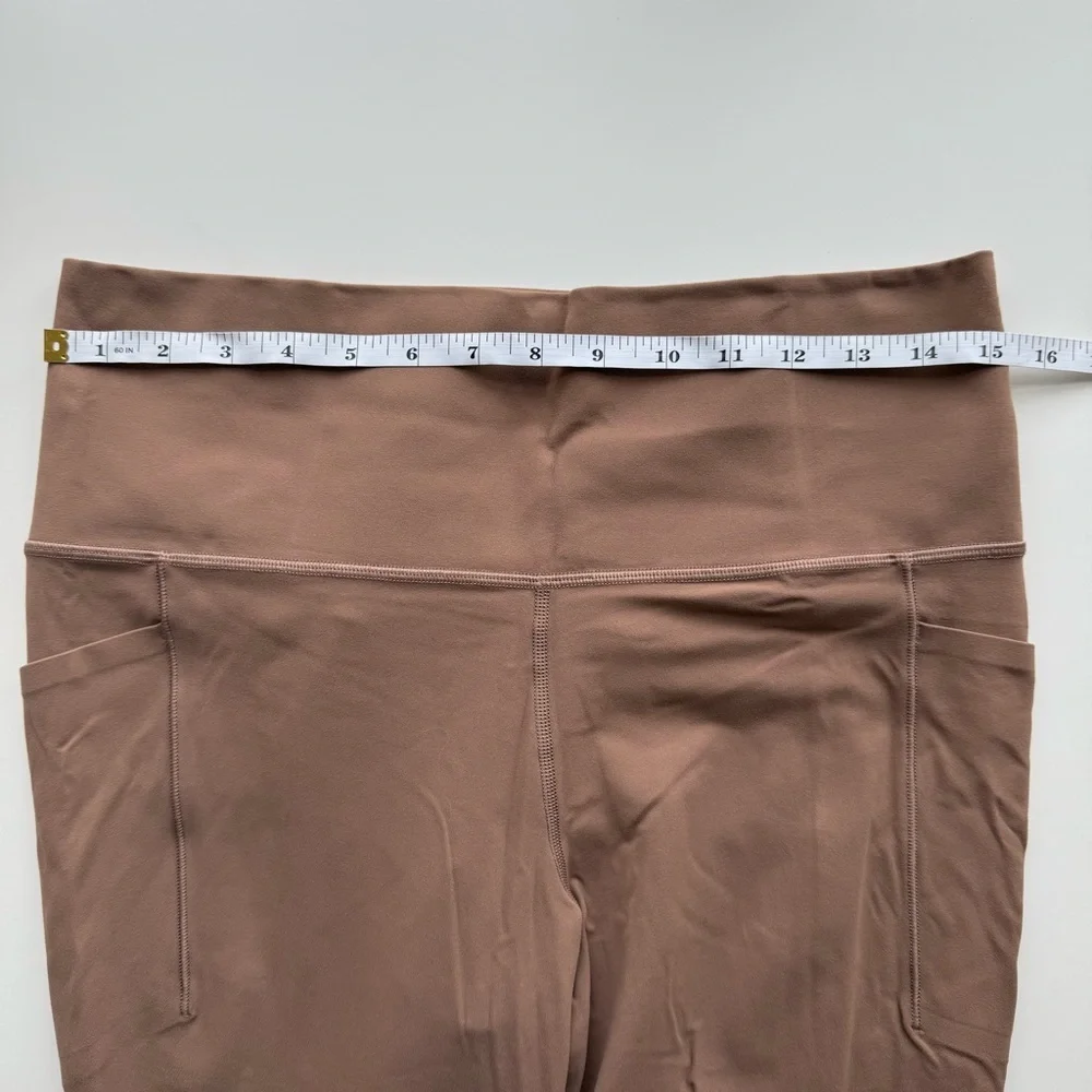 Athleta Salutation Stash Tight Size Large